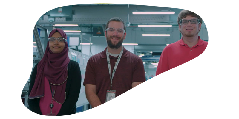 Blog-Engineering Day 2026-Monica with team in factory.png