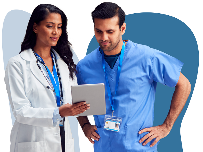 two healthcare professionals talking.png